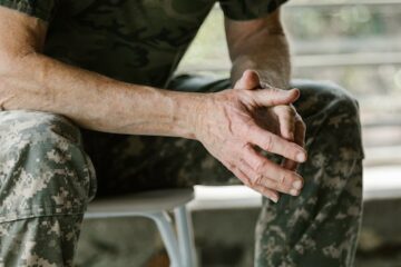 A veteran sitting in a therapy room in need of Rehab in San Antonio for Your Alcohol Addiction