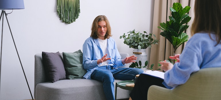 A person talks openly to the therapist, which is crucial when using psychotherapy in addiction treatment.